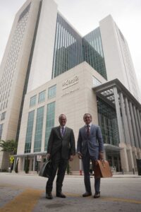 Attorneys Phillips and Tadros standing outside the Broward County Courthouse
