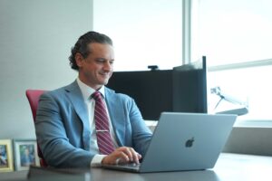 Attorney Chris Tadros studying a lawsuit.