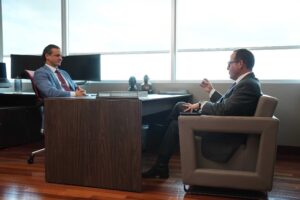 Attorneys Philips and Tadros conferring about a motorcycle accident case