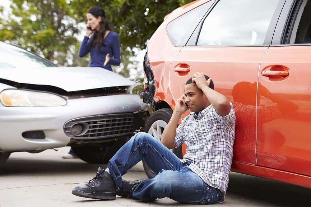 Female driver got hit by an uninsured motorist calling her insurance.